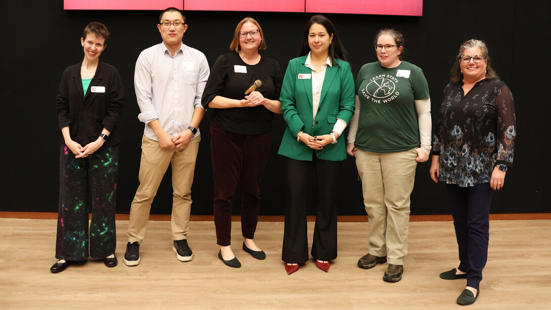 Faculty Slam participants Ran Wang (second from left), Shannon Bartelt–Hunt, Jamilla Teixeira and Susan VanderPlas
