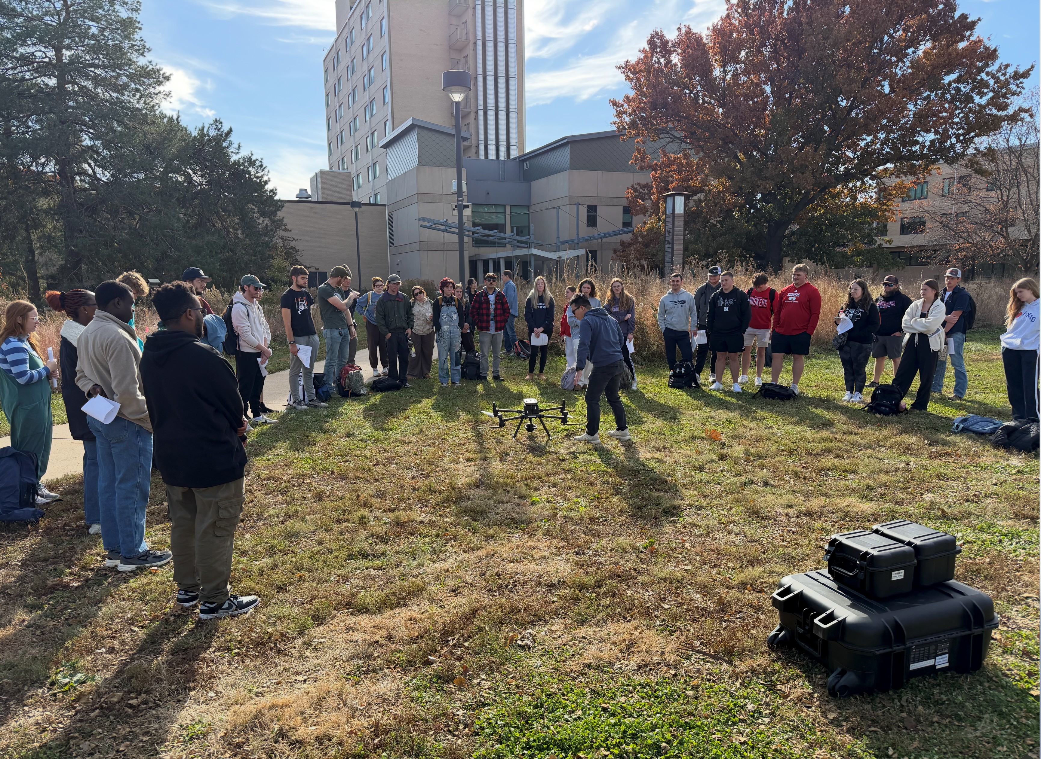 Biquan Zhao, a postdoctoral research associate in the Department of Animal Science, teaches University of Nebraska–Lincoln students about drones and their sensors.